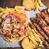 Hash House A Go Go: A Foodie’s Paradise in Las Vegas 6 greek gyros on a pita bread P3WTR9W