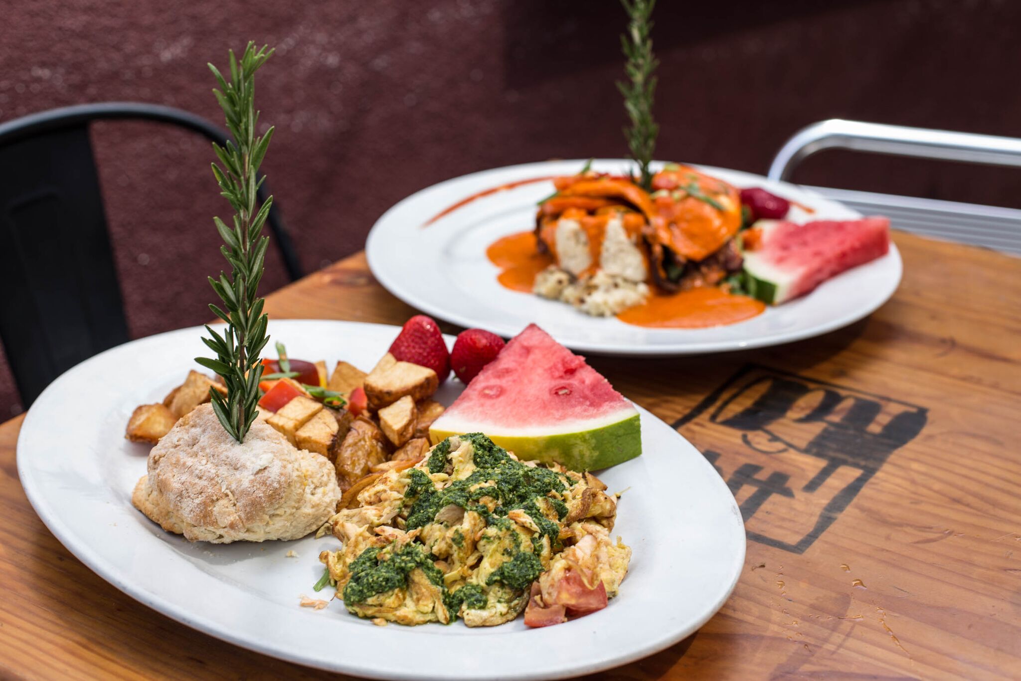 Hearty brunch items from the Hash House A Go Go menu in Las Vegas, including chilaquiles, corned beef hash skillet, and brown sugar bacon