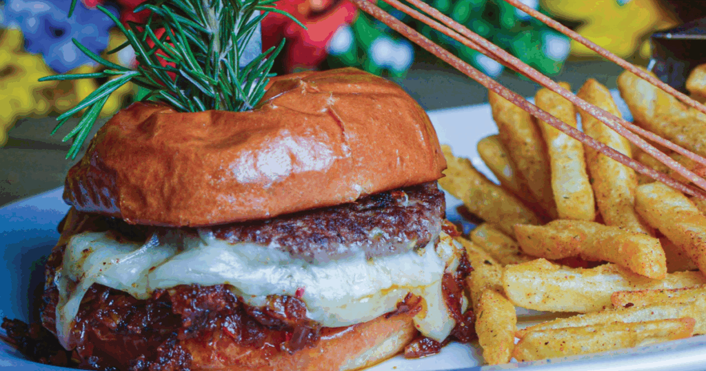 What’s New at Hash House West Sahara? A Full Tour of the Summer Menu 1 Bacon Onion Jam Burger served with seasoned fries at Hash House A Go Go West Sahara in Las Vegas