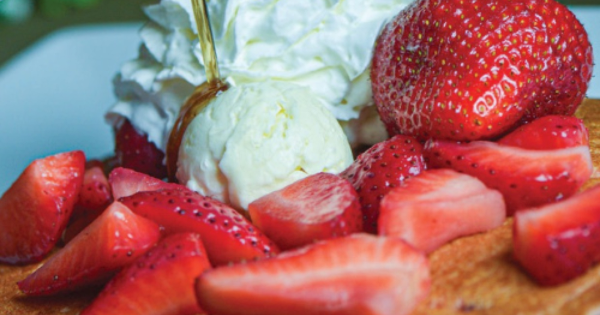 Johnny Hoe 'Cakes topped with whipped cream and strawberries at Hash House A Go Go West Sahara in Las Vegas