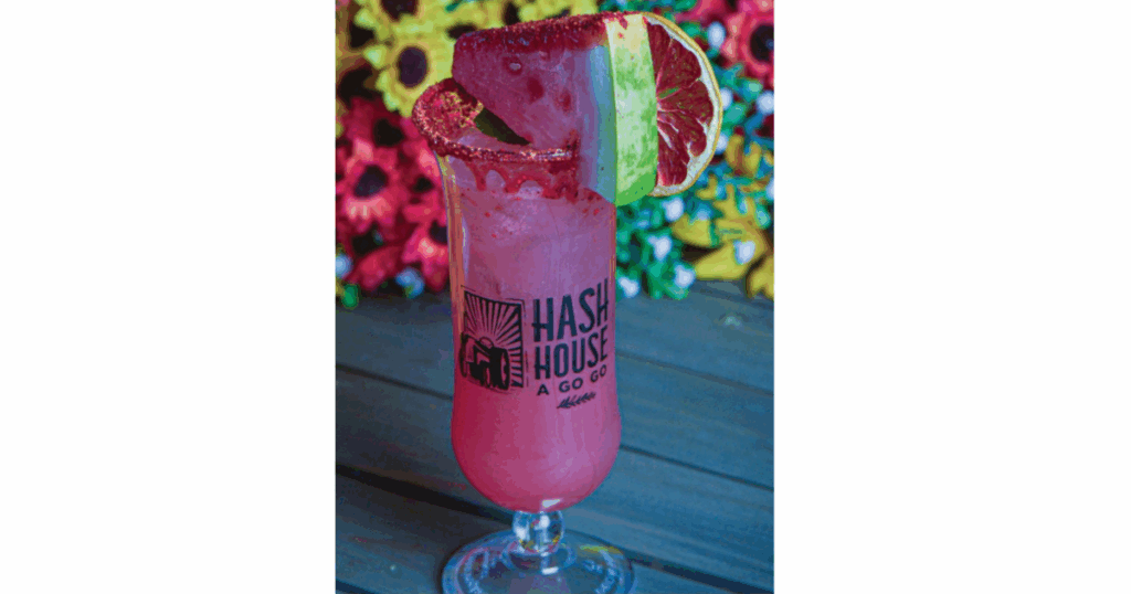 Watermelon ‘Loma cocktail and pancakes with grapefruit and lime garnish at Hash House A Go Go West Sahara in Las Vegas