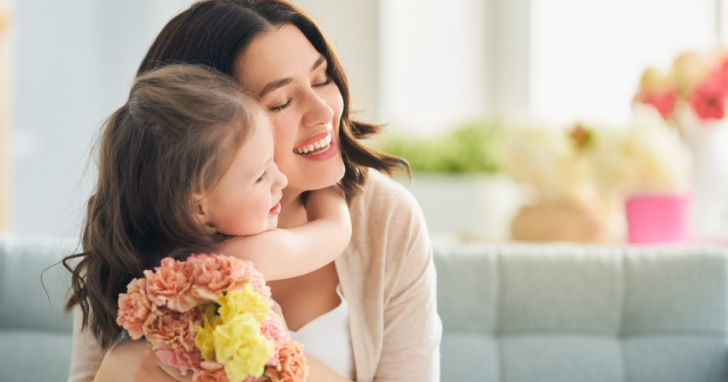 Mother and child celebrating Mother’s Day with flowers, promoting Mother’s Day brunch at Hash House A Go Go West Sahara with limited-time menu favorites in Las Vegas.